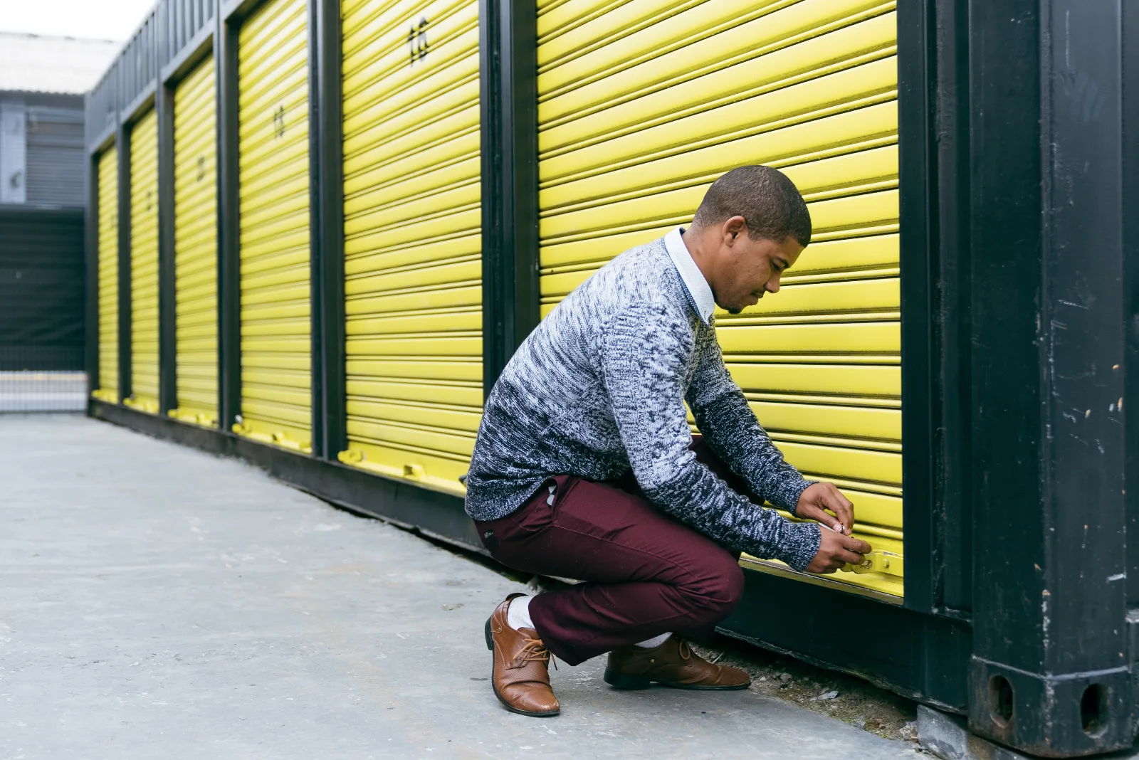 Customer unlocking a storage unit at Cape Storit Paarden Eiland